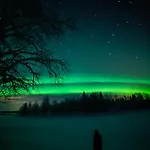 Lapland Aurora Riverside Chalet *