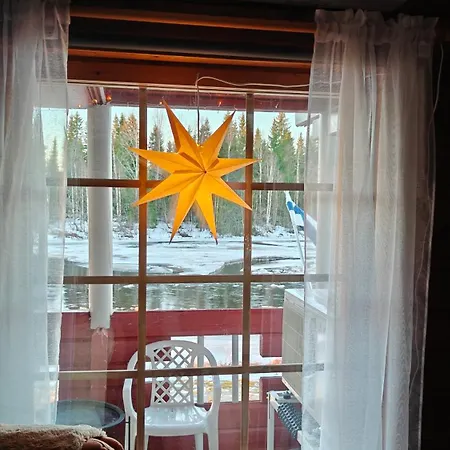 Lapland Aurora Riverside Chalet *