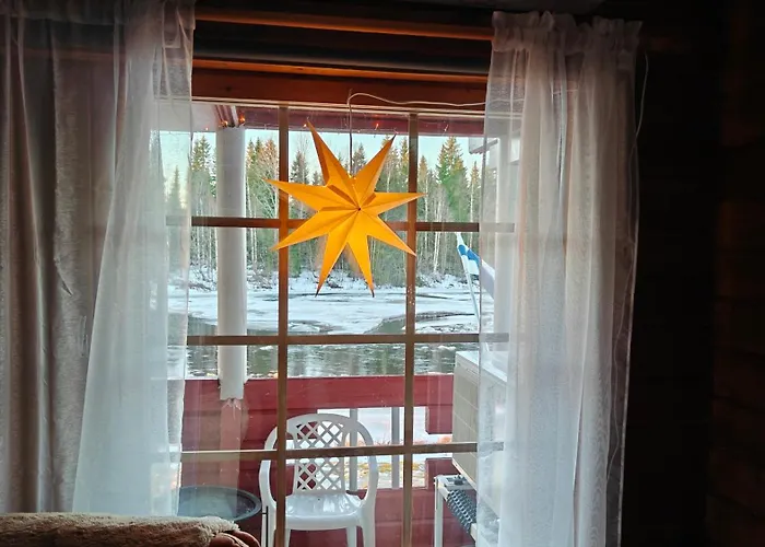 Lapland Aurora Riverside Chalet *